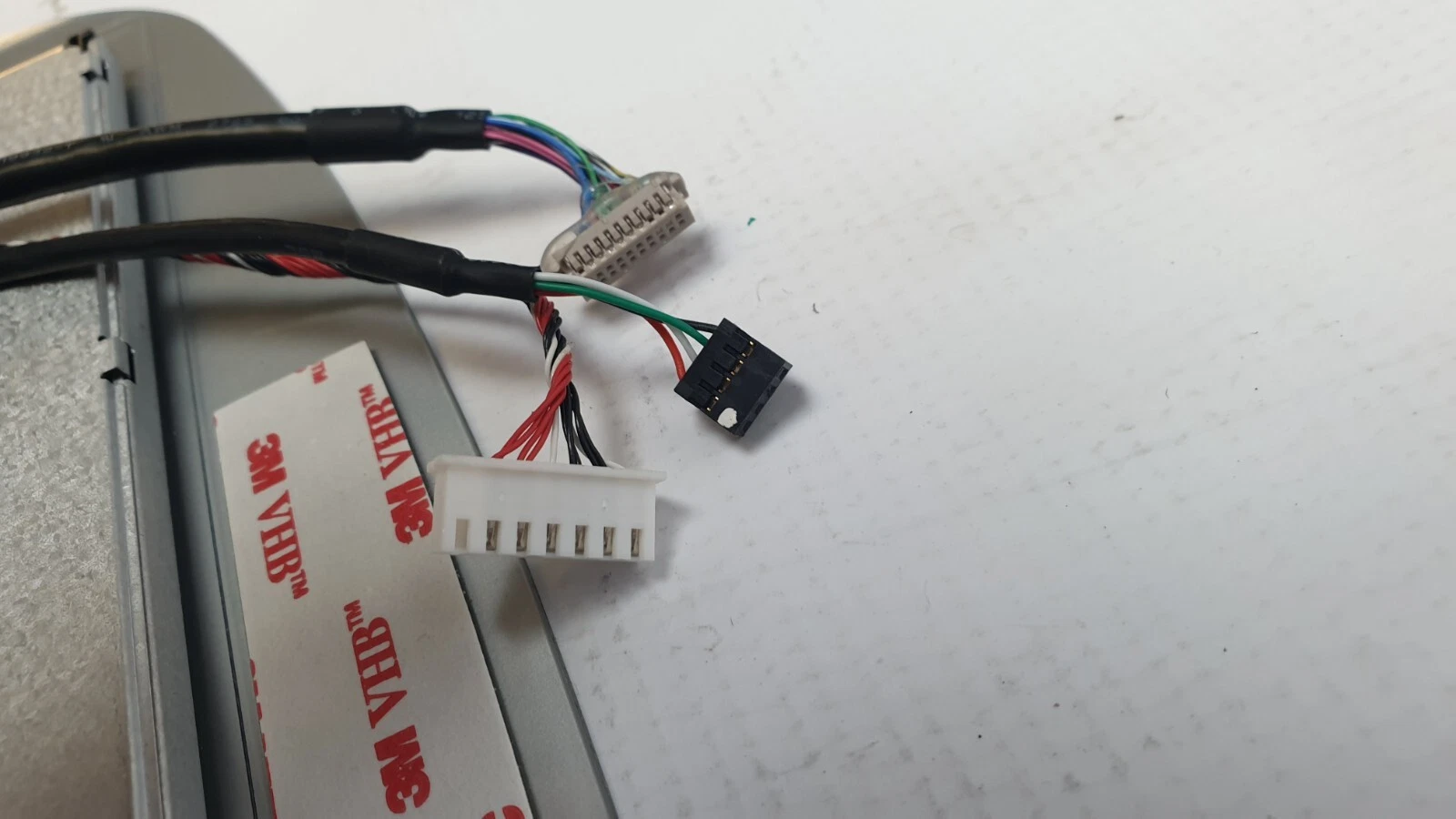 Harness connectors of the ALCD-12P2-LM LCD assembly and 3M VHB tape on the bezel