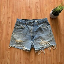 Vintage 90's woman's distressed faded Levi's shorts 