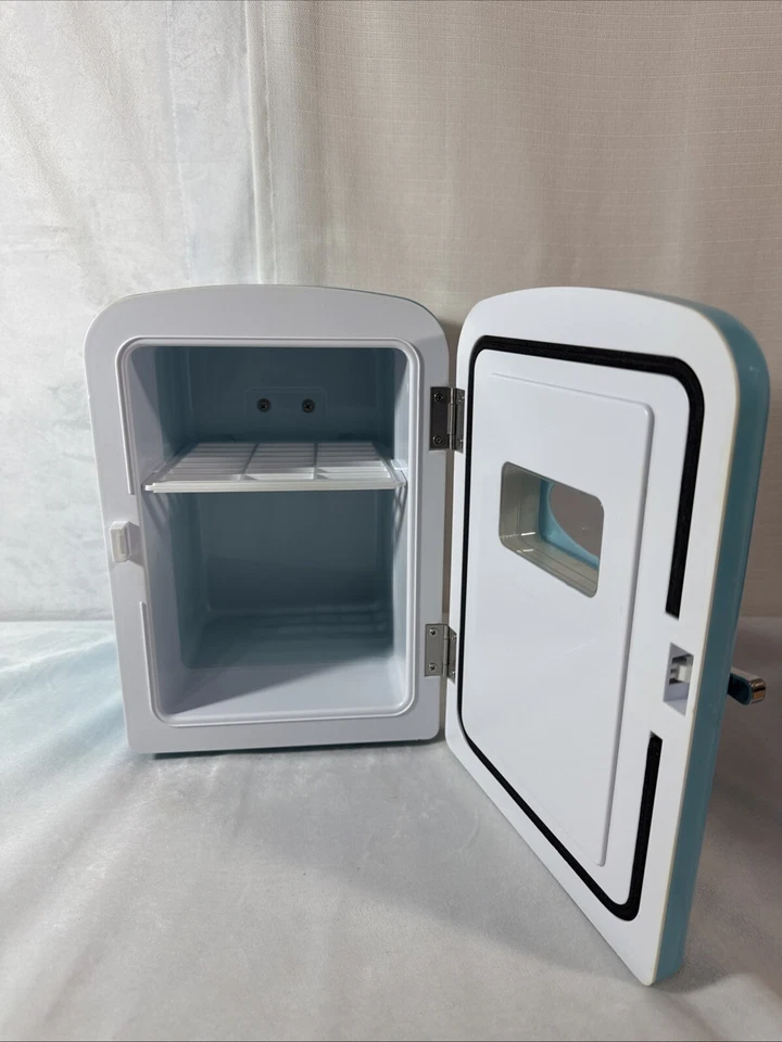 Mini refrigerador de bebidas Igloo (MIS129-B-AZUL) - Tiene capacidad para 6 latas (0,14 cuft) Foto 3 de 4