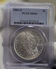 1884 O US Morgan Silver Dollar $1 PCGS MS64