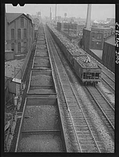 Cleveland, Ohio. On the left, a Pennsylvania Railroad iron ore train about to