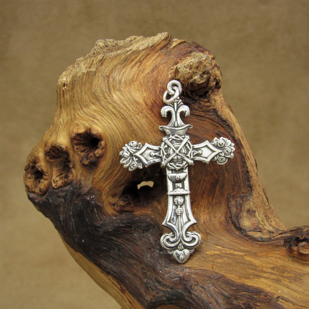 Ornate Sterling Silver Cross Pendant with Sitio on the back