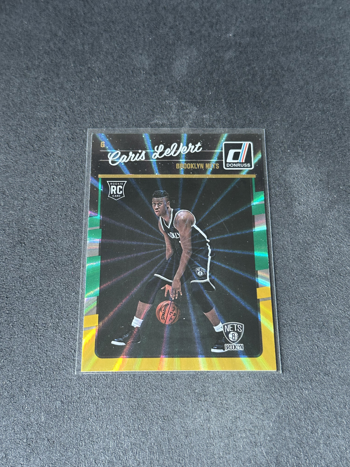 Caris LeVert 2016-17 Panini Donruss Green and Yellow Holo Laser RC #167