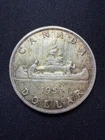 1957 1 waterline Canadian Silver Dollar Coin