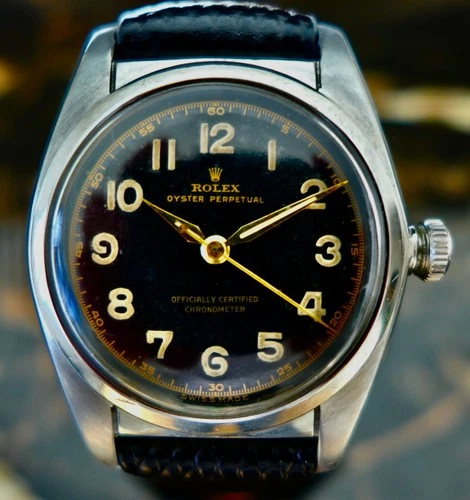 A RARE VINTAGE 1940s MILITARY ROLEX OYSTER CHRONOMETER "BUBBLEBACK" R. 5050