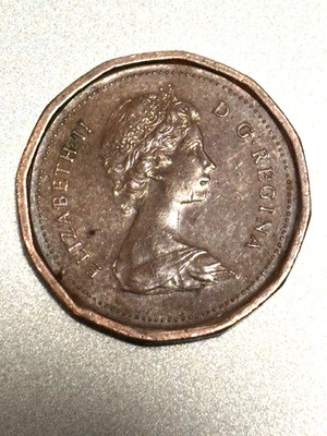 1982 Canadian Penny, small bead 12-sided bronze, rare 1% mintage. Potential MS60