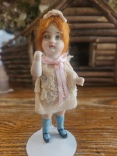 Antique Germany 4" All Bisque Doll with Jointed Head Arms and Legs Great Outfit