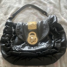 Borsa a tracolla Steven nera plissettata chiusura girevole hardware oro tasche foderate leopardate