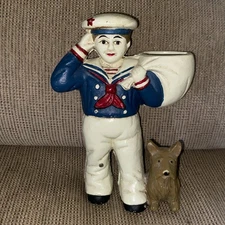 VINTAGE HEAVY CAST IRON SALUTING SALIOR WITH DOG DOOR STOP-Cracker Jack ?