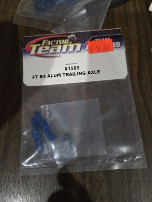 FACTORY TEAM Associated Racing #1585 FT B4 Aluminum Trailing Axle, Vintage NIP