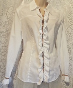 white blouse with ruffles in front