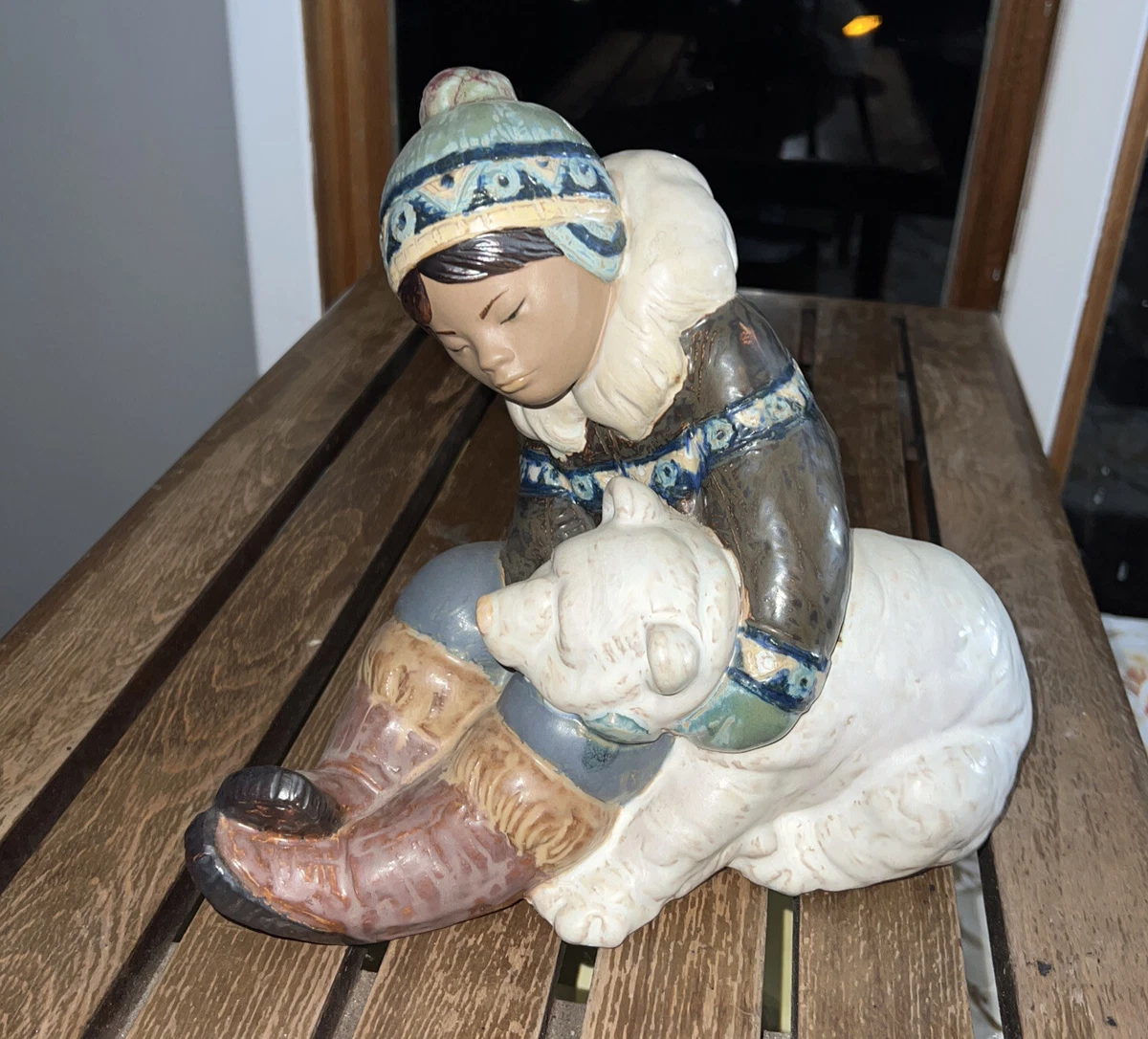 Lladro eskimo boy with polar bear cub hot sale