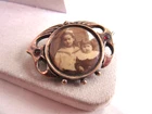 Antique Victorian photo brooch in art nouveau brass frame