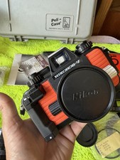 Nikon Nikonos-V Orange Underwater Film Camera with Lenses and Protective Case