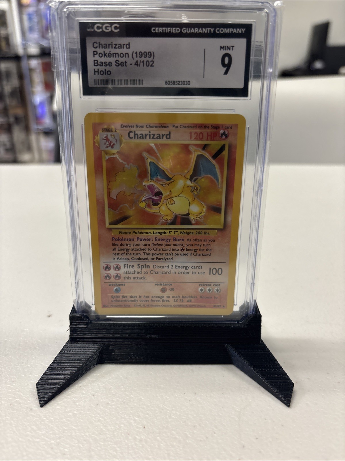 1999 Pokemon Charizard Base Set #004/102 - Holo CGC 9