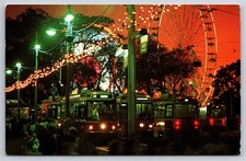 Light Rail Vehicles at Night in Toronto Canada Vtg Postcard Ferris Wheels Lights