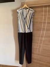 Tuta Motivi taglia 40 vestibilita’ S/M, comoda, leggera, come nuova.