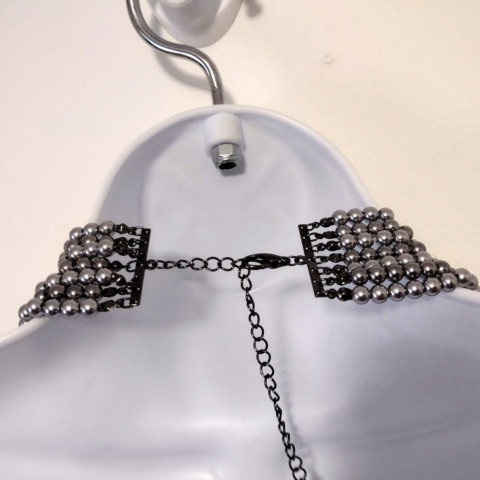 Faux Pearl Multi Strand Draped Necklace with Side Bow… Gem