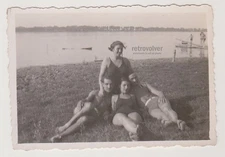 Handsome Young Man Lean Shirtless Gay Int & Women Friends Together By The Lake