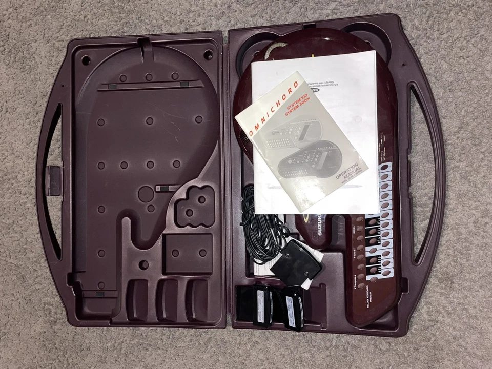 Guitarra digital Suzuki Q Chord QC-1 Songcard con estuche y fuente de alimentación. Foto 2 de 3