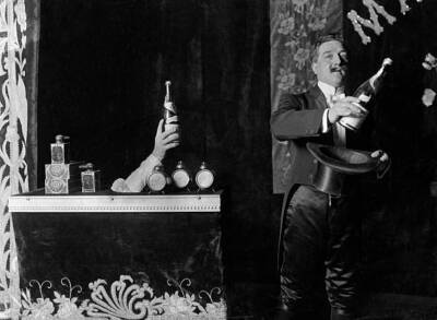 Conjurer during a performance Legerdemain with magic hat 1909 Old Photo