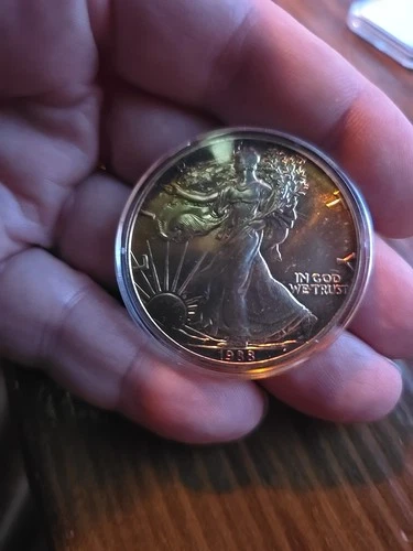 1988 AMERICAN SILVER EAGLE TONED 1 TROY OZ .999 FINE SILVER