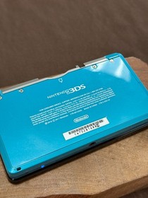 Nintendo 3DS metallic/ Green handheld game console with charger