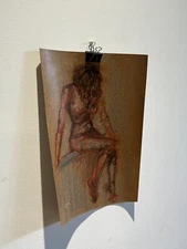 Abstract women oil pastel painting. In brown color. A3 format.