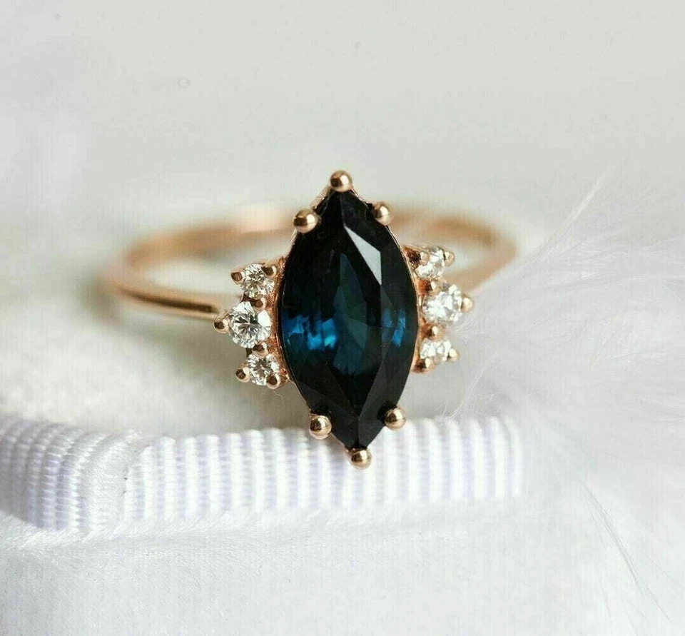 Anillo de compromiso solitario topacio azul Londres corte marquesa de 2 quilates oro rosa de 14 quilates Foto 2 de 4