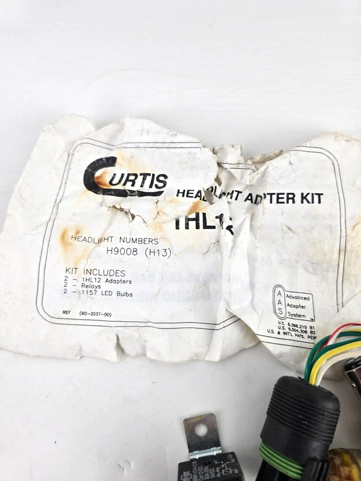 Неполный комплект адаптеров для фары снегоочистителя Curtis 1HL12 для Jeep GMC Yukon 2007-2009 годов выпуска - Изображение 2 из 2