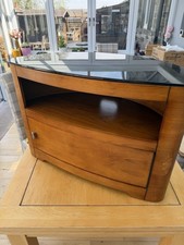 TV Stand - Curved Wood Design with black glass top, shelf and bottom cabinet