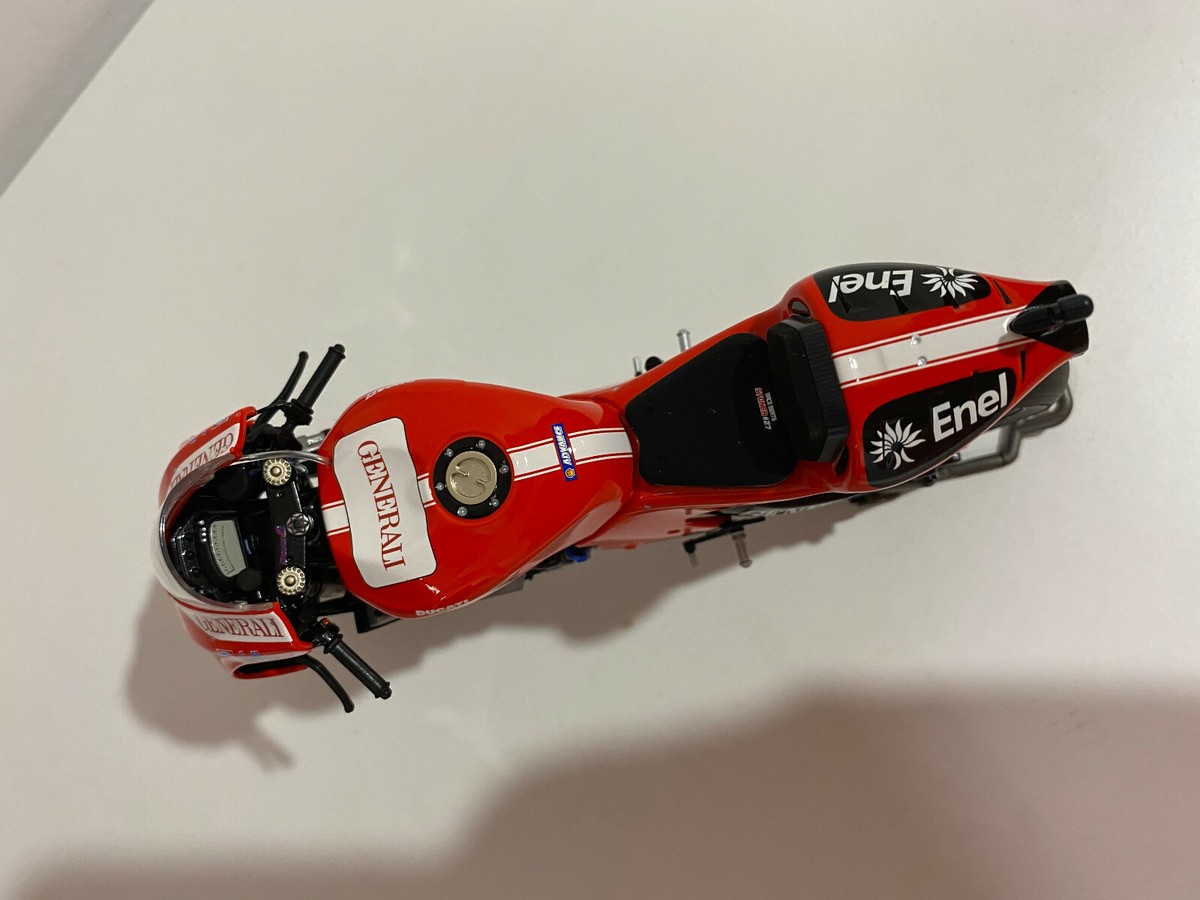 Minichamps 122100027 Ducati Desmosedici GP10 Casey Stoner 1/12 #NEW#