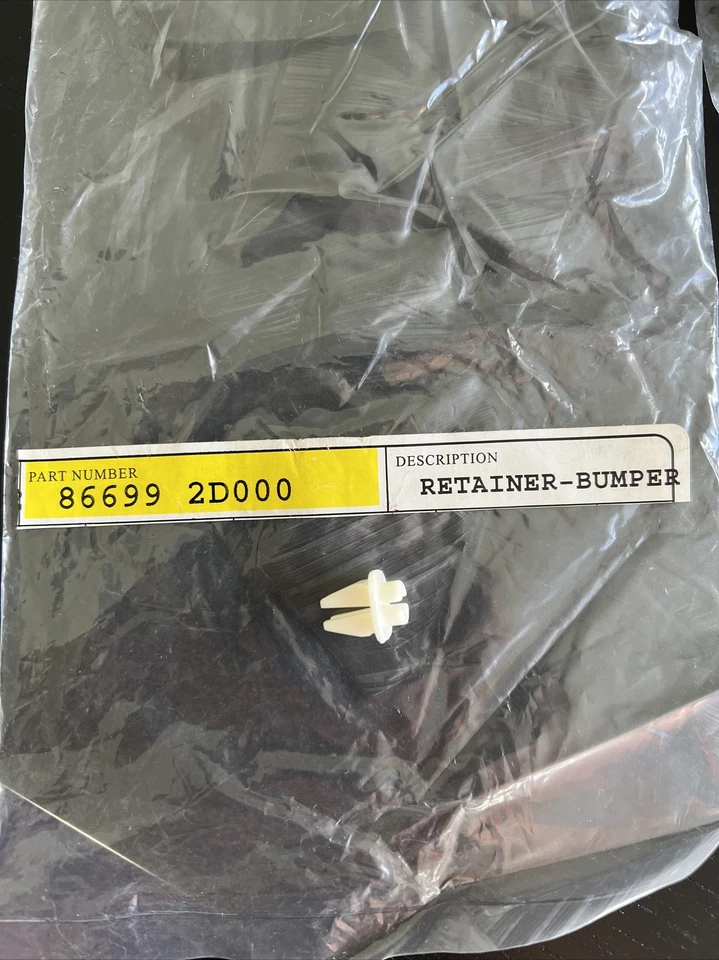 KIA OEM 10-16 Forte parachoques trasero cubierta retenedor 866992D000 Foto 2 de 4