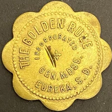 The Golden Rule Gen Mdse. Eureka, SD Brass G/F 50¢ Trade Token 27mm