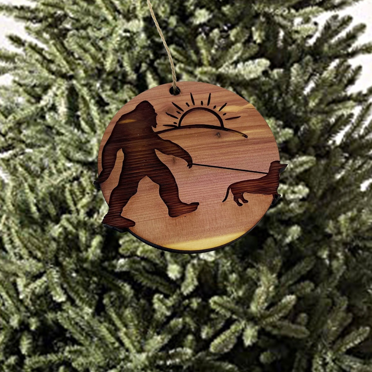 Sasquatch walking his dog - Cedar Ornament Sasquatch walking his dog - Cedar Ornament