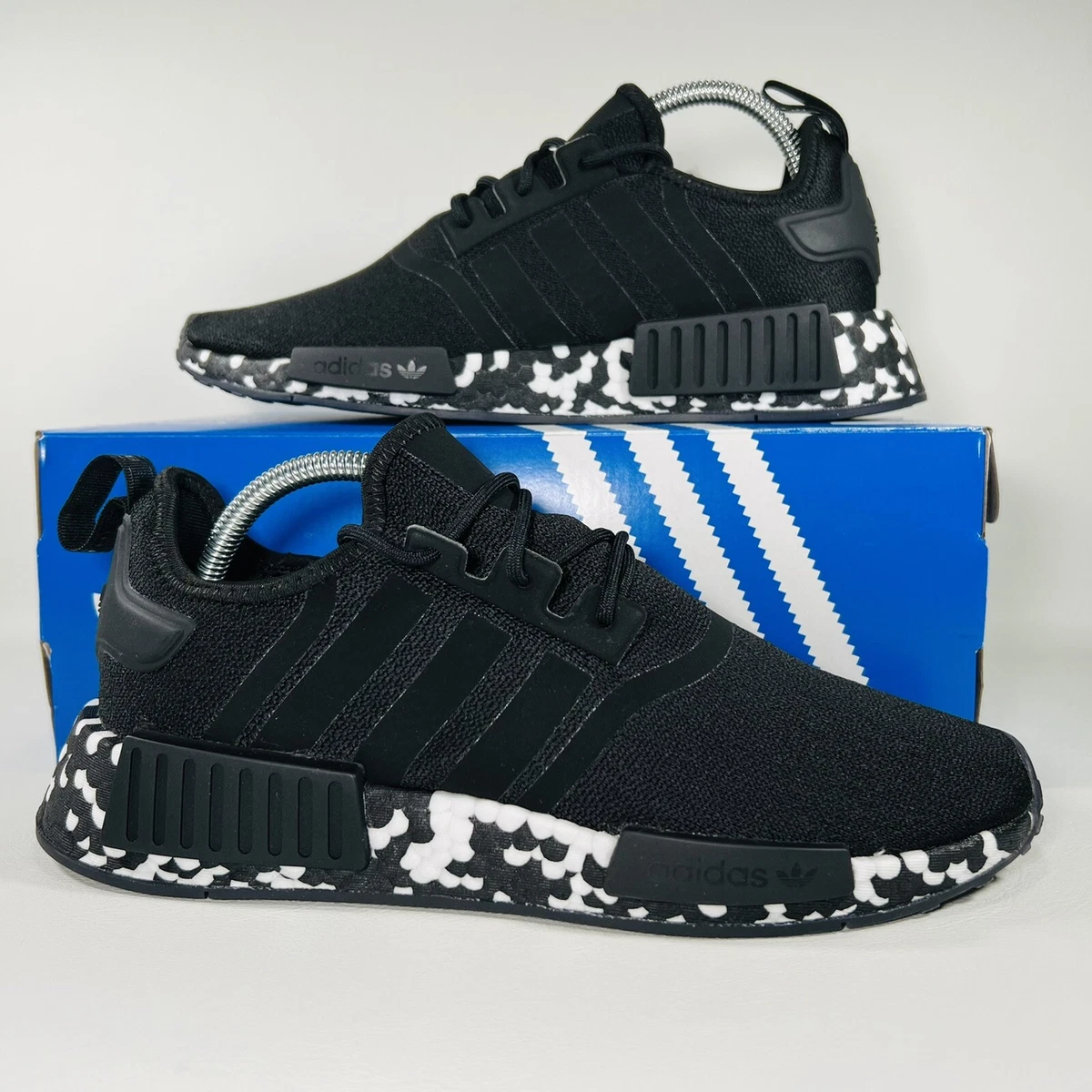 Black and white sales adidas trainers mens