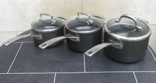 Le Creuset Toughened Non-Stick 3 Piece Set 16, 18, 20, cm. One has Incorrect Lid