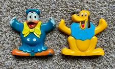 Disney Vintage Cragstan Pluto and Donald Duck Spinout Cartwheel Toys