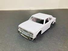 AUTO-WORLD Datsun 510 body - unpainted with CHROME BUMPERS for AFX, AURORA, HO