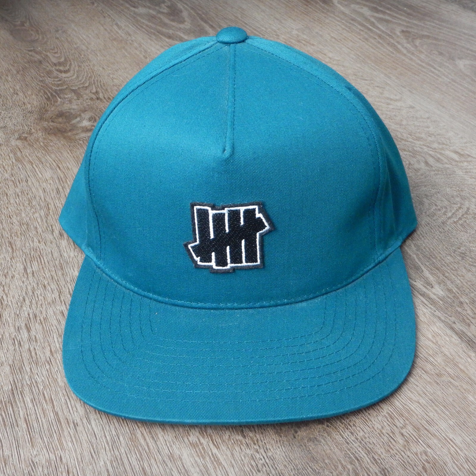 SAMPLE Undefeated Turquoise Five Strikes Logo Sna… - image 2