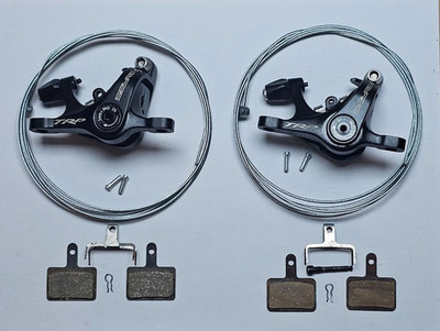 TRP Spyre-C Mechanischer Scheibenbremsensatz Post Mount Bremssättel + Beläge + Kabel + Enden