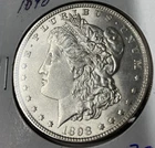 (A) 1898 SILVER BU MORGAN DOLLAR 1$