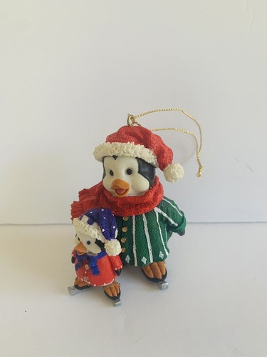 Kirkland Signature Christmas Ornament Penquin with Baby Penquin on Ice Skates - Picture 3 of 9