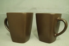 pair Echo Point collection  brown ceramic hot chocolate coffee mugs.