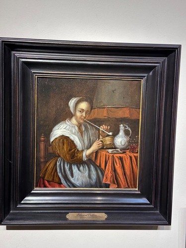 Edward Collier 1640-1708 Oil on Panel - woman smoking at a table