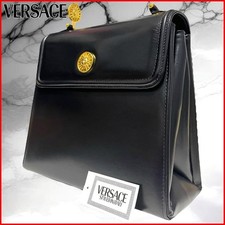 Versace: Beautiful genuine leather sunburst and gold hardware formal vanity case