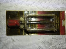 This is an AmPro Steering Wheel Lock Plate Re...