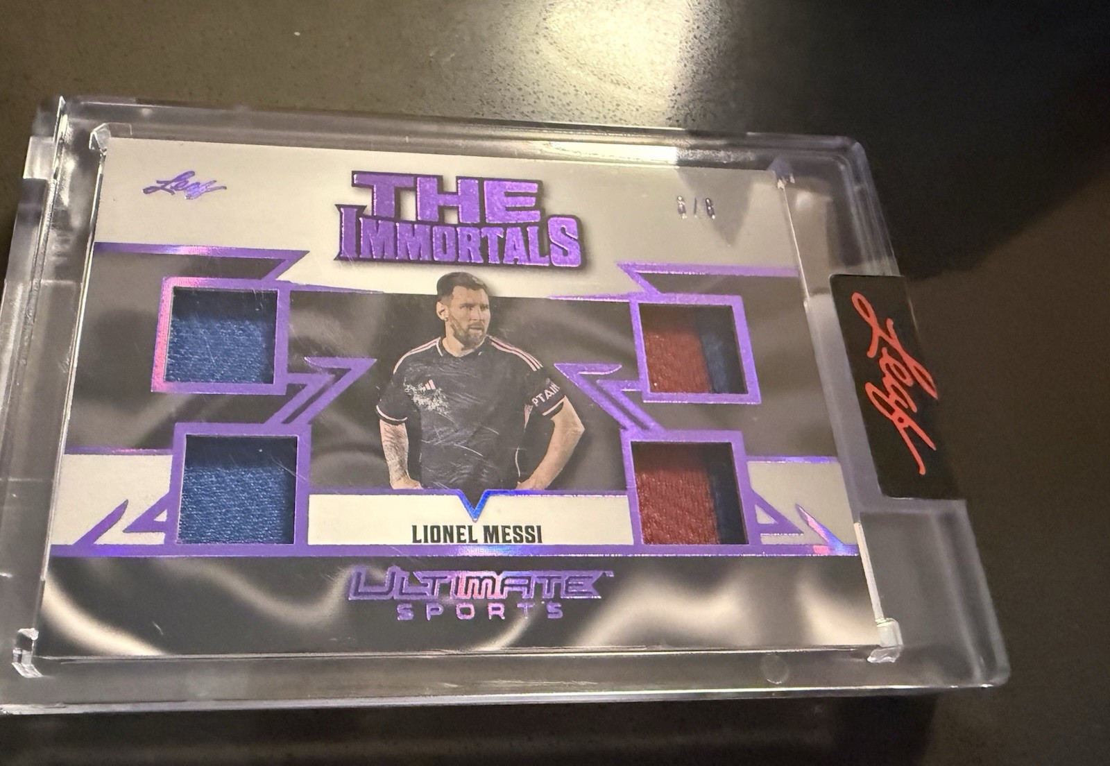 Lionel Messi 2024 The Immortals Quad Relic 3/8 view 1