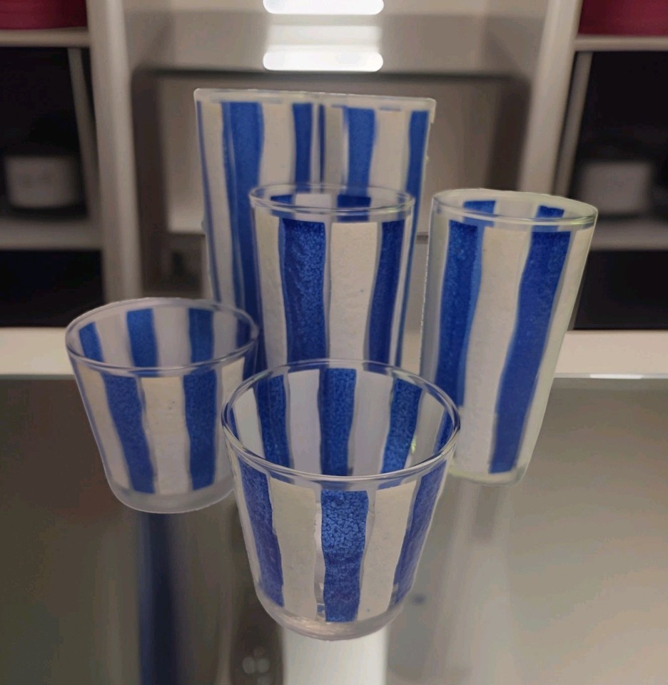 A complete set of 6 Libbey MCM awning-stripe glasses in blue and white — the kind of glassware that makes a retro summer cocktail hour look effortlessly cool.