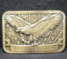 XF09120 NOS VINTAGE 2003  FREEDOM IS NOT FREE  PATRIOTIC BRASS BELT BUCKLE